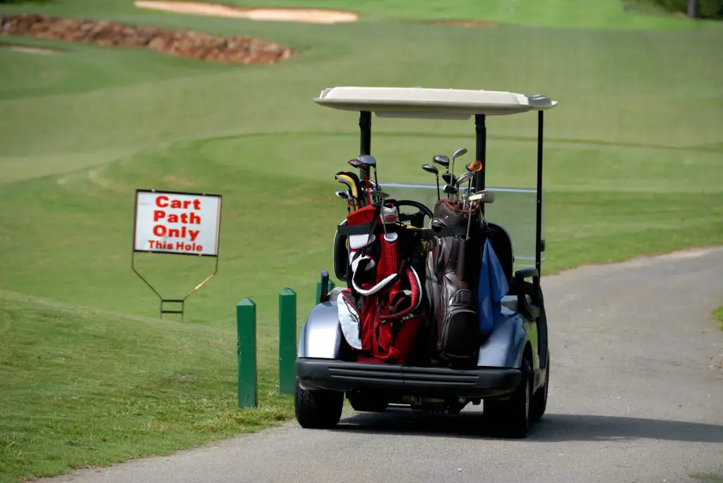 golf cart, transportation, golf bags